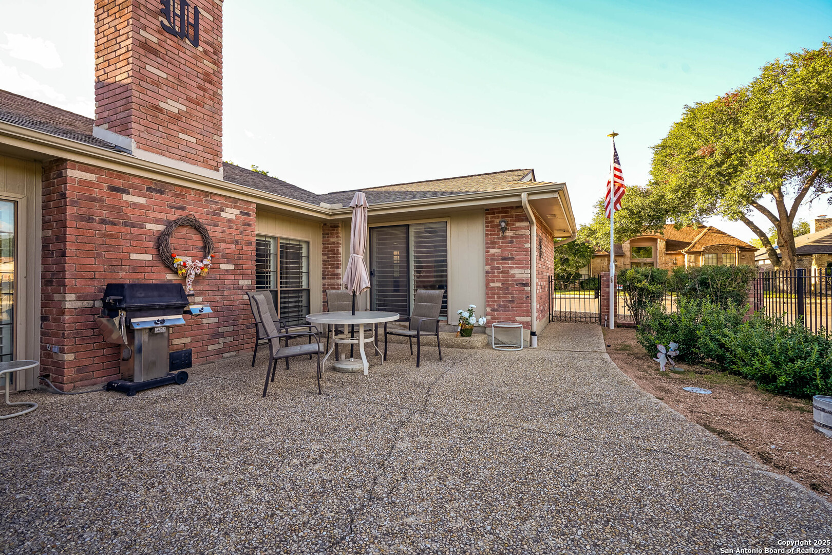 6118 Crescent Falls Windcrest, TX 78239 - Photo 56 of 60 a view of a house with a backyard and a patio