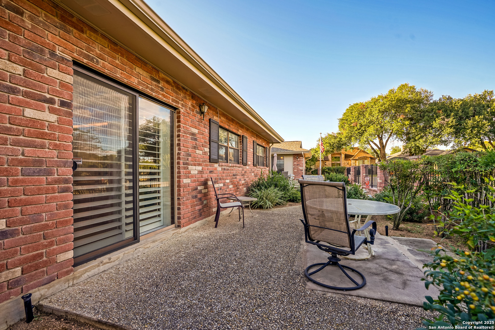 6118 Crescent Falls Windcrest, TX 78239 - Photo 57 of 60 a view of house with a table and chairs and a barbeque