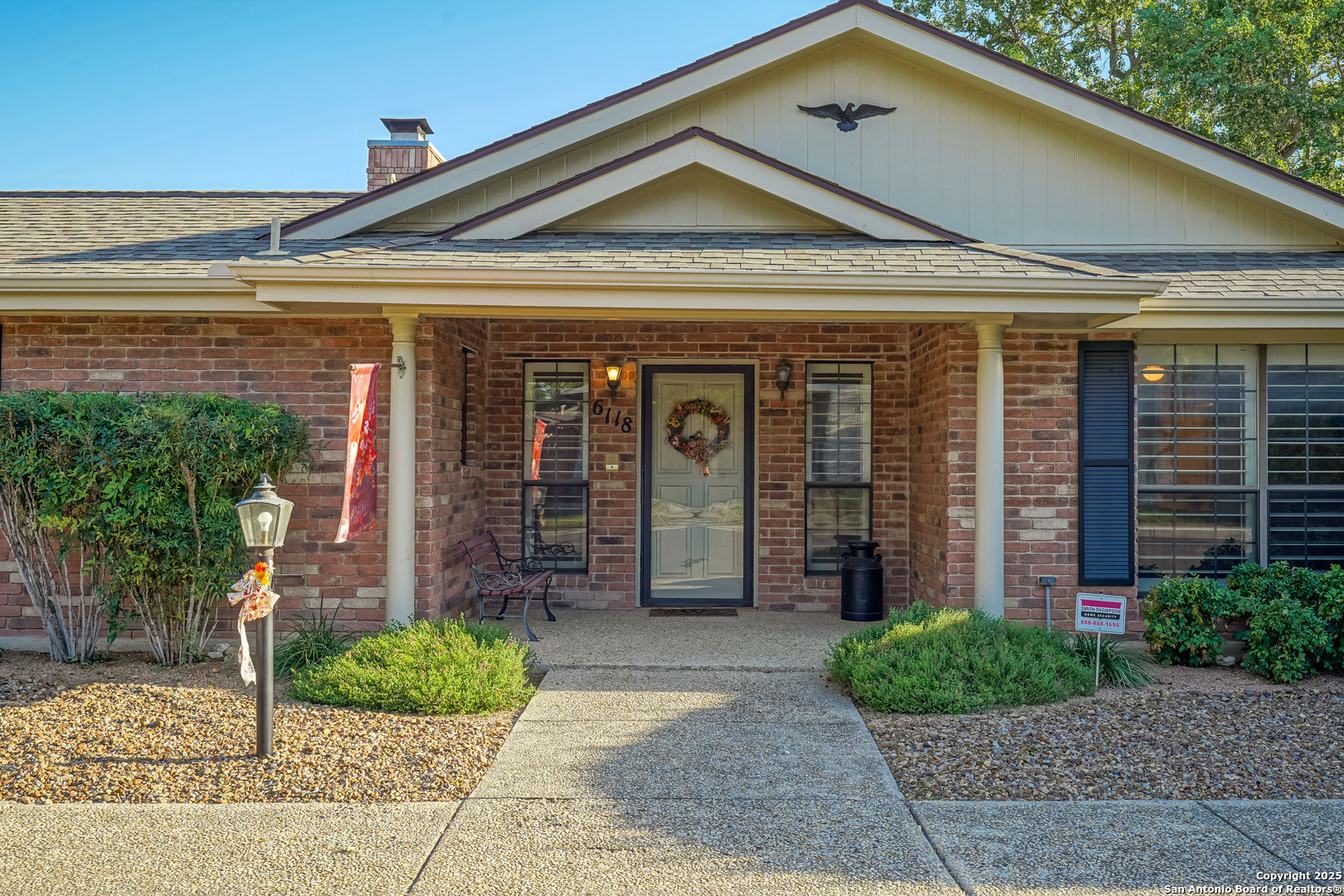 6118 Crescent Falls Windcrest, TX 78239 - Photo 7 of 60 a front view of a house with garden