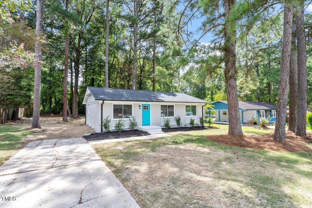 507 Forest Ridge Road Garner, NC 27529 - Photo 26 of 33 a view of a house with a yard