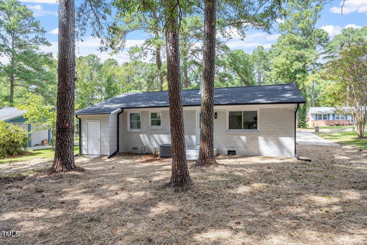 507 Forest Ridge Road Garner, NC 27529 - Photo 29 of 33 a house with trees in the background