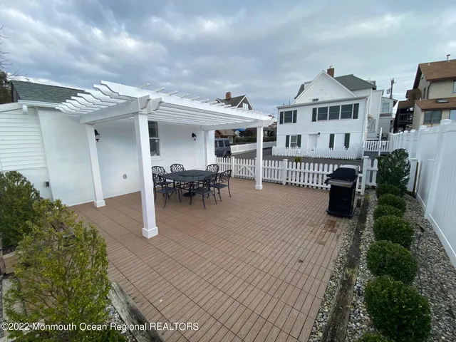 front view of a house with a patio