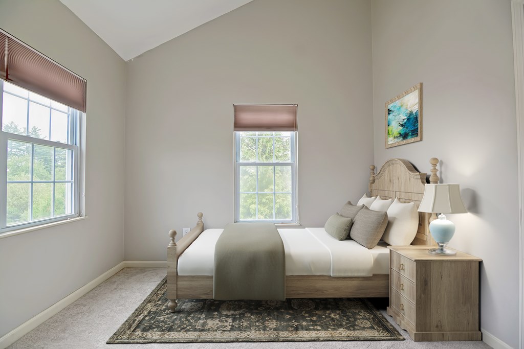 43 Turtle Brook Road, Unit 43 Canton, MA 02021 - Photo 16 of 28 a bedroom with a bed and wooden floor