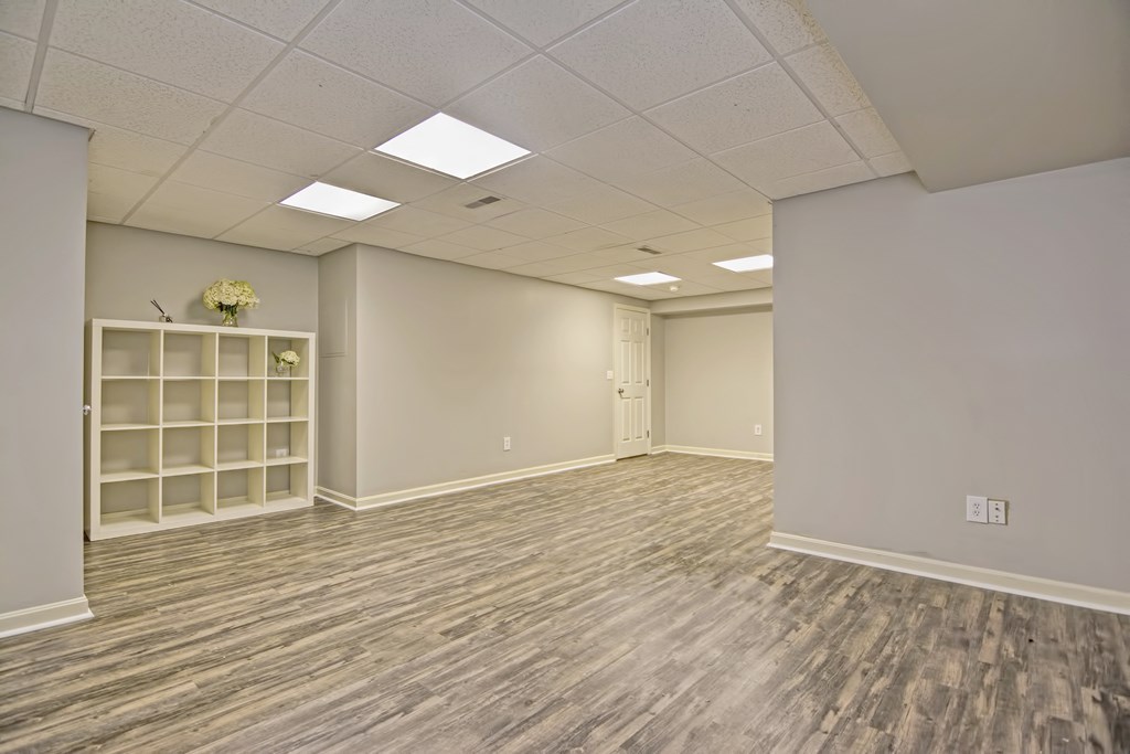 43 Turtle Brook Road, Unit 43 Canton, MA 02021 - Photo 22 of 28 an empty room with wooden floor and windows
