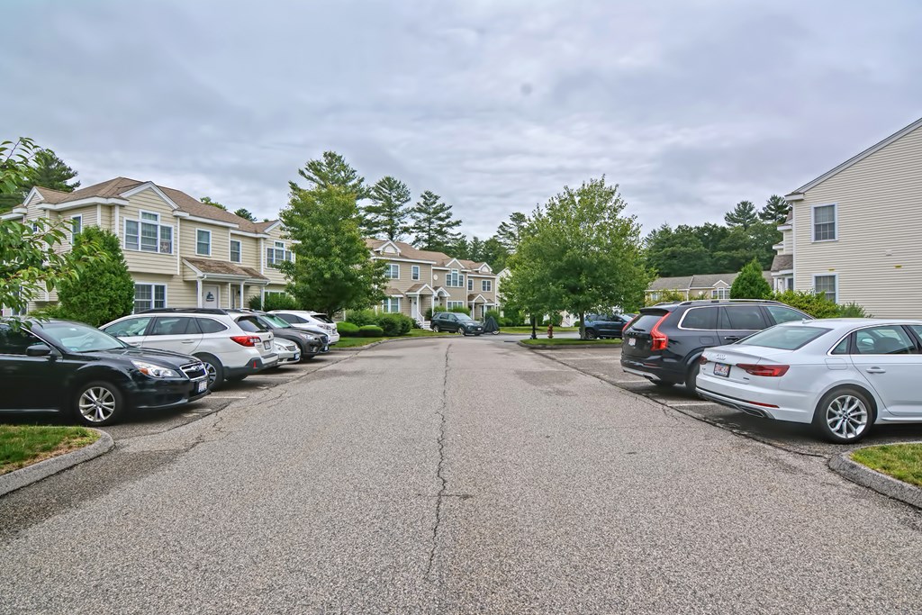 43 Turtle Brook Road, Unit 43 Canton, MA 02021 - Photo 25 of 28 a car parked on the side of a street