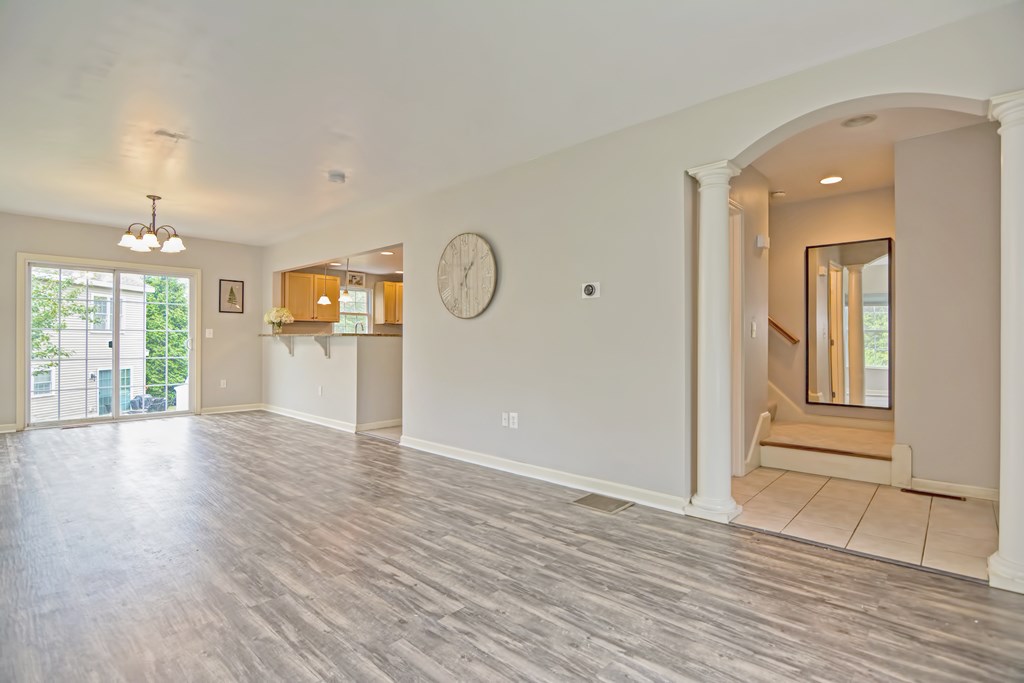 43 Turtle Brook Road, Unit 43 Canton, MA 02021 - Photo 6 of 28 an empty room with wooden floor and windows
