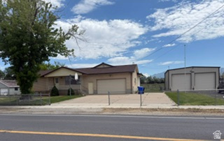 588 North 4500 West West Point, UT 84015 - Photo 1 of 61 Ranch-style residence featuring a two-car garage and a paved driveway