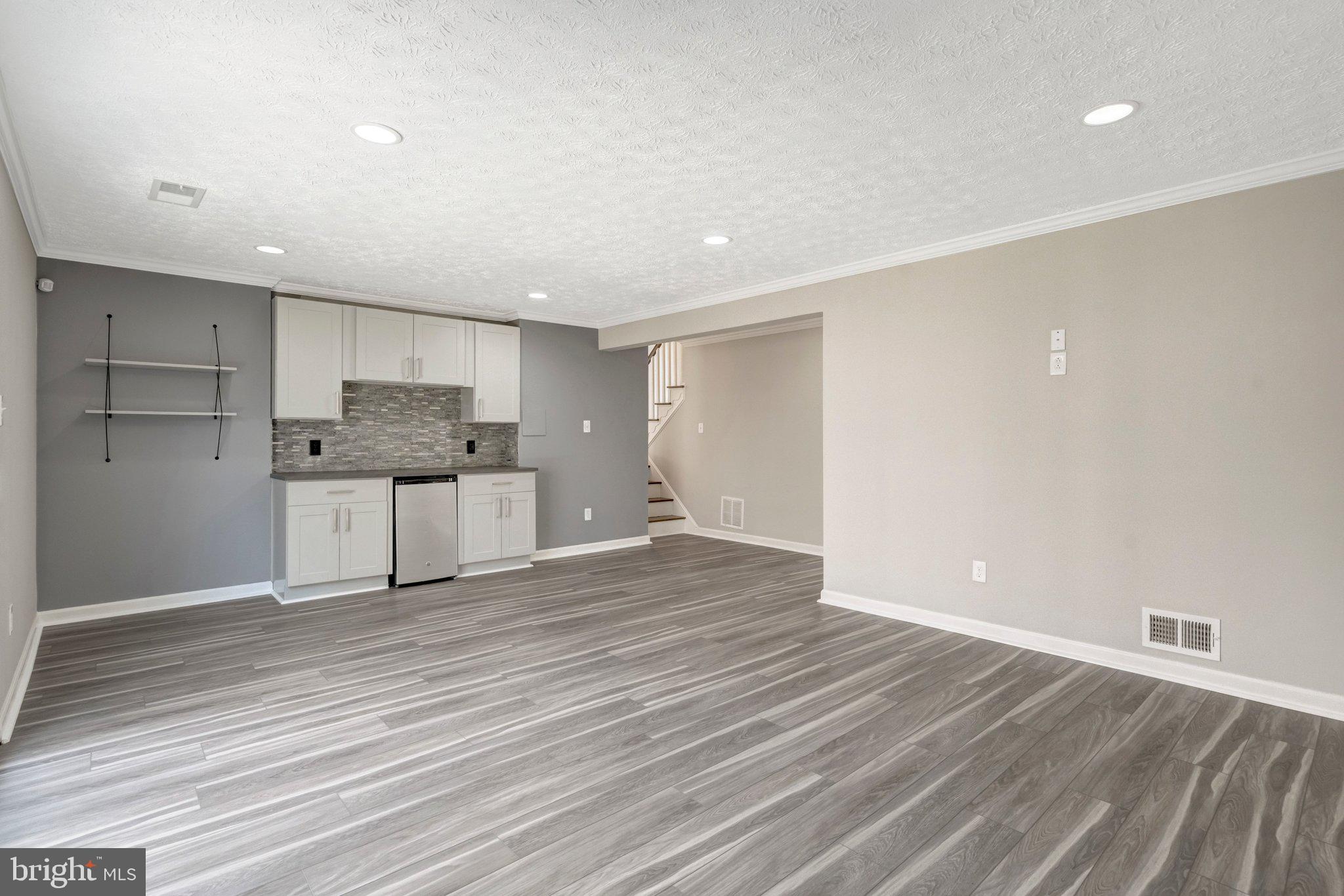 9315 Winbourne Road Burke, VA 22015 - Photo 30 of 51 a view of kitchen with wooden floor