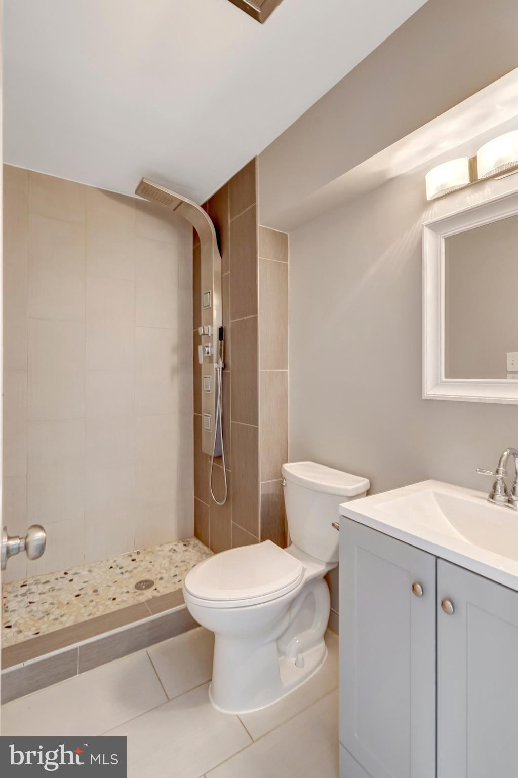 9315 Winbourne Road Burke, VA 22015 - Photo 39 of 51 a white toilet sitting next to a bathroom sink