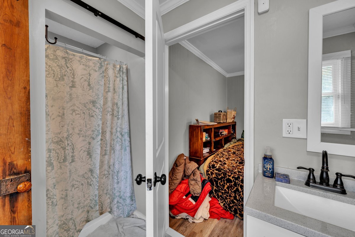 418 Flintside Drive Cobb, GA 31735 - Photo 19 of 45 a view of a bedroom with a bed and a closet