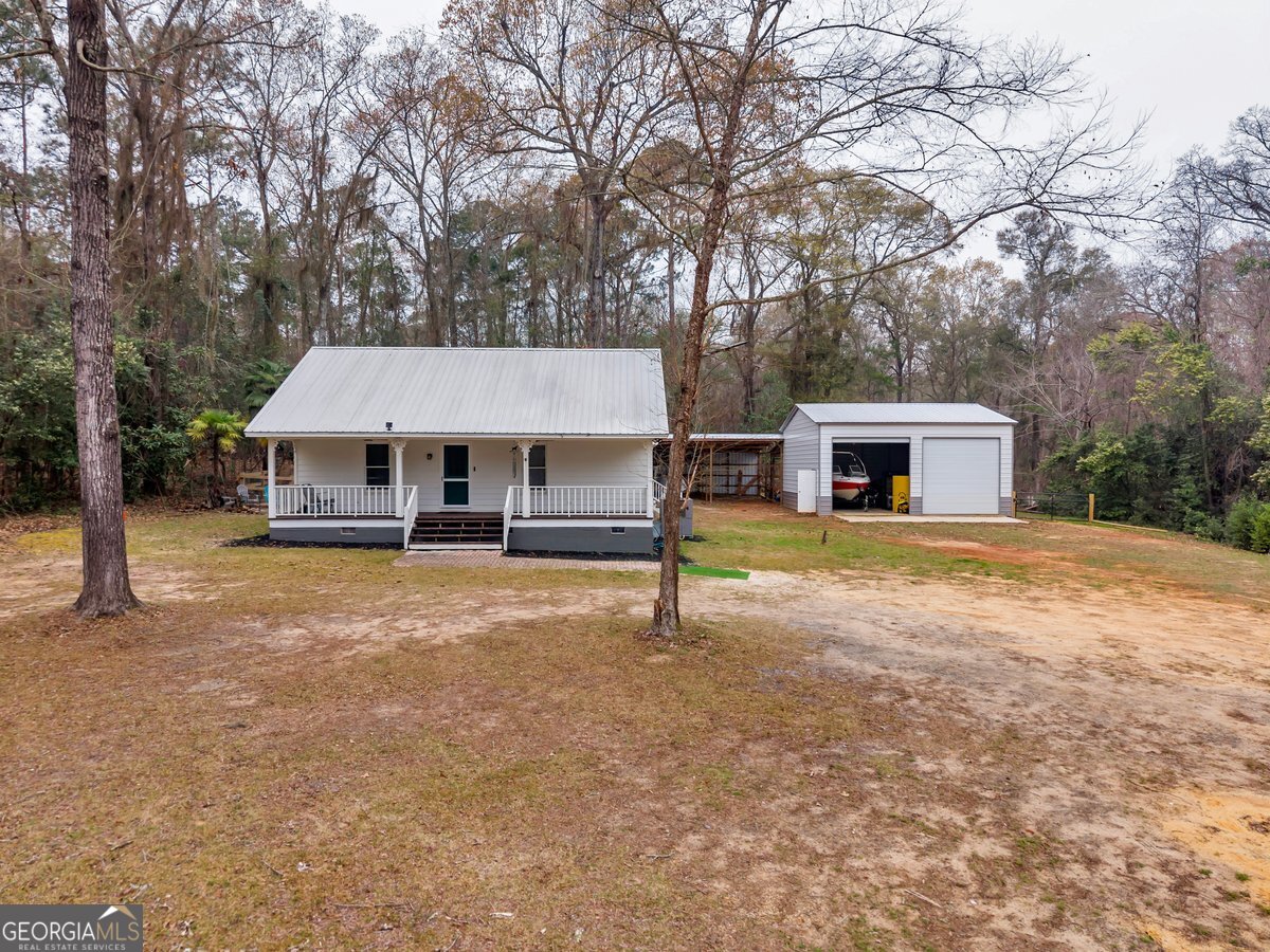 418 Flintside Drive Cobb, GA 31735 - Photo 35 of 45 a house view with a outdoor space
