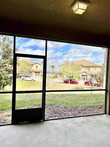 a view of a large window with an outdoor view