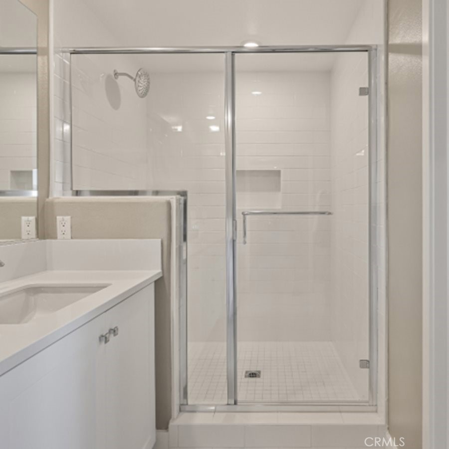 474 Lobata Irvine, CA 92618 - Photo 17 of 43 a bathroom with a shower and a sink