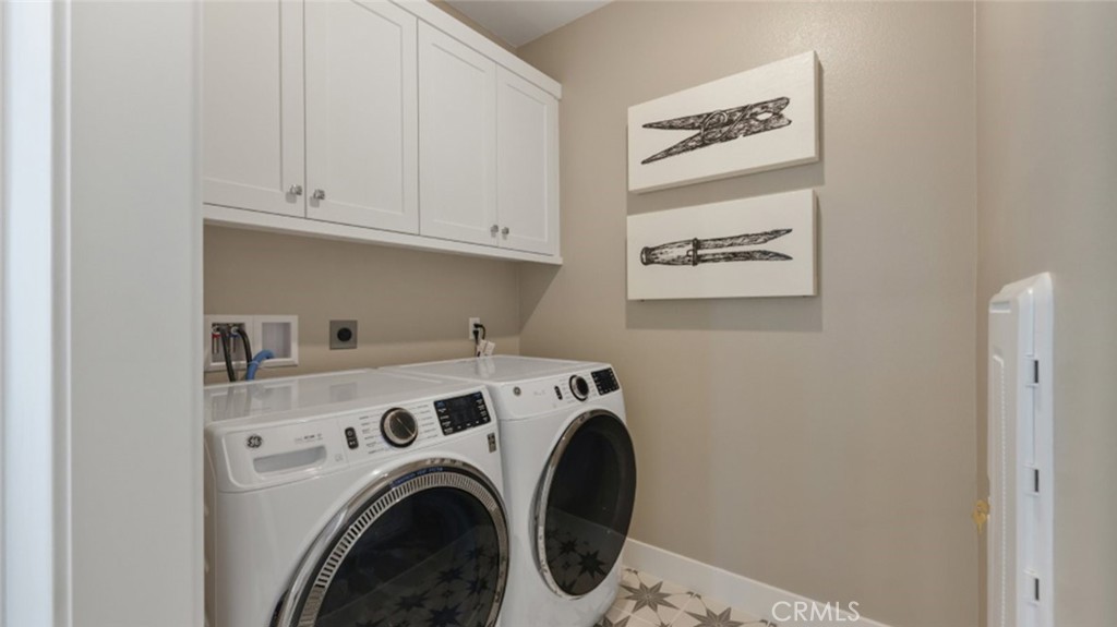 474 Lobata Irvine, CA 92618 - Photo 31 of 43 a utility room with dryer and washer
