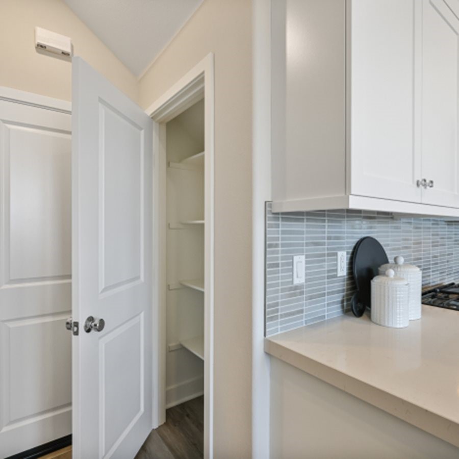474 Lobata Irvine, CA 92618 - Photo 7 of 43 a close view of a sink and utility room in a cabinet