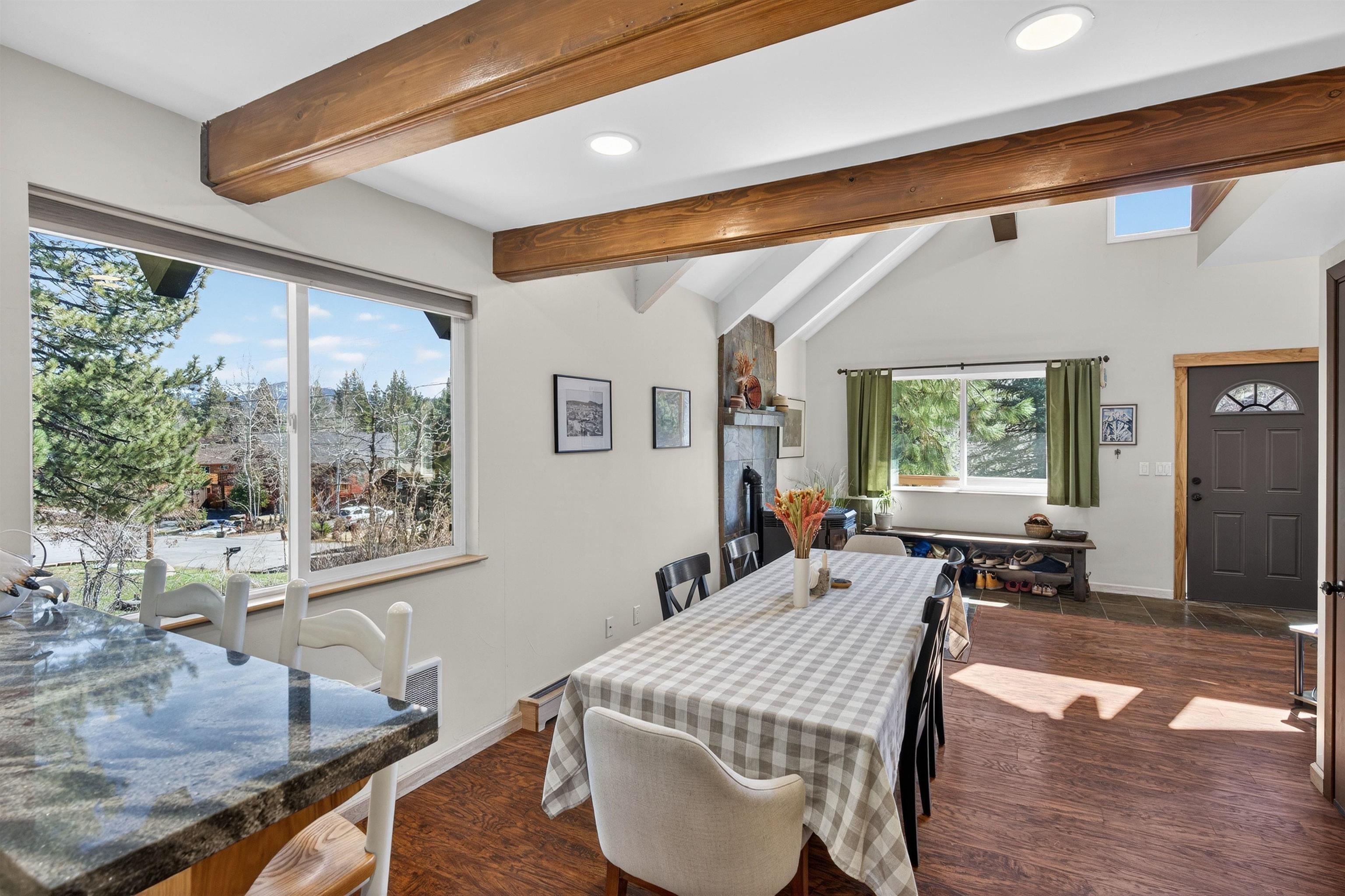 10220 Columbine Road Truckee, CA 96161 - Photo 16 of 28 a living room with furniture a large window and wooden floor