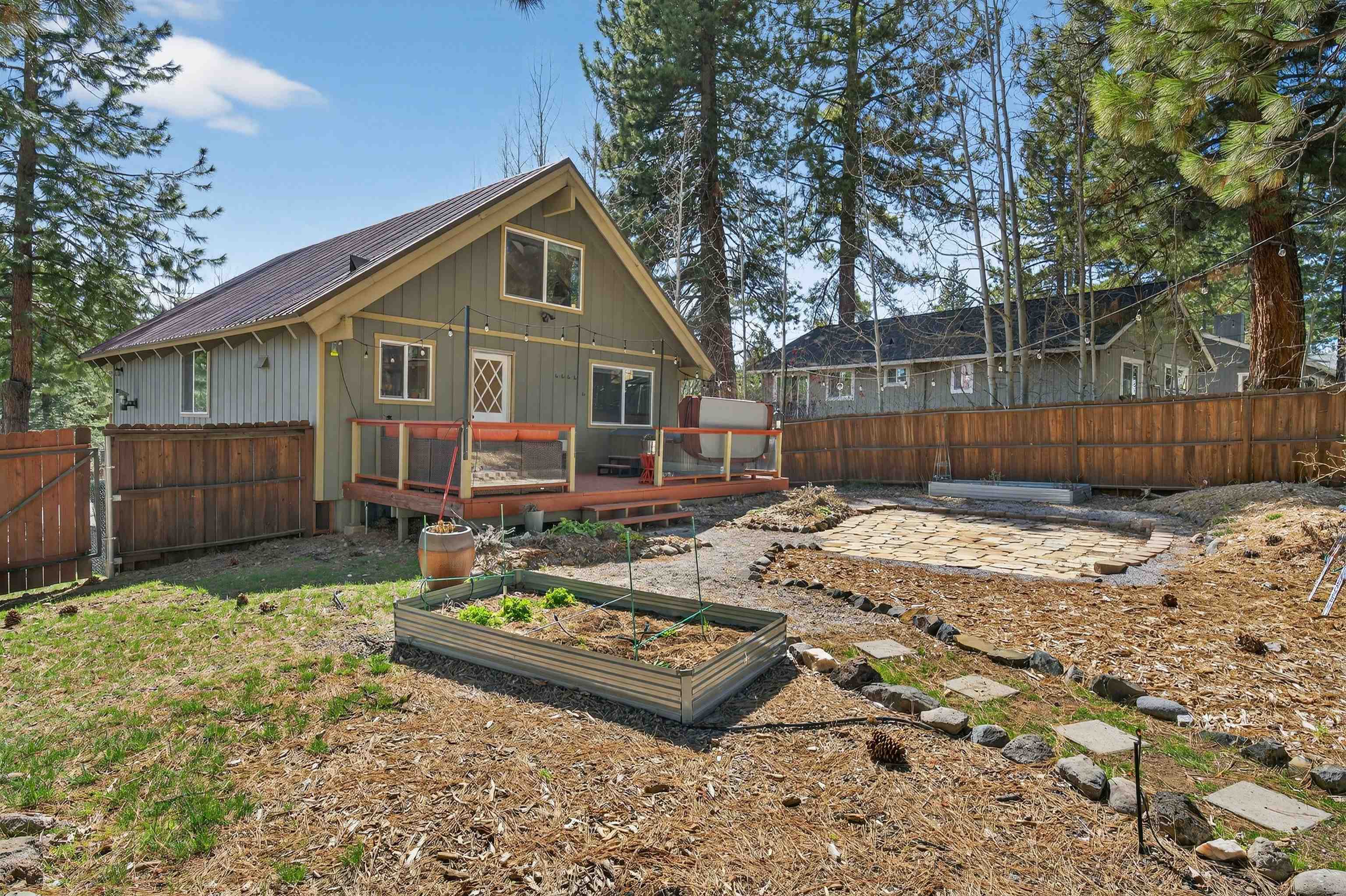 10220 Columbine Road Truckee, CA 96161 - Photo 24 of 28 a front view of a house with garden