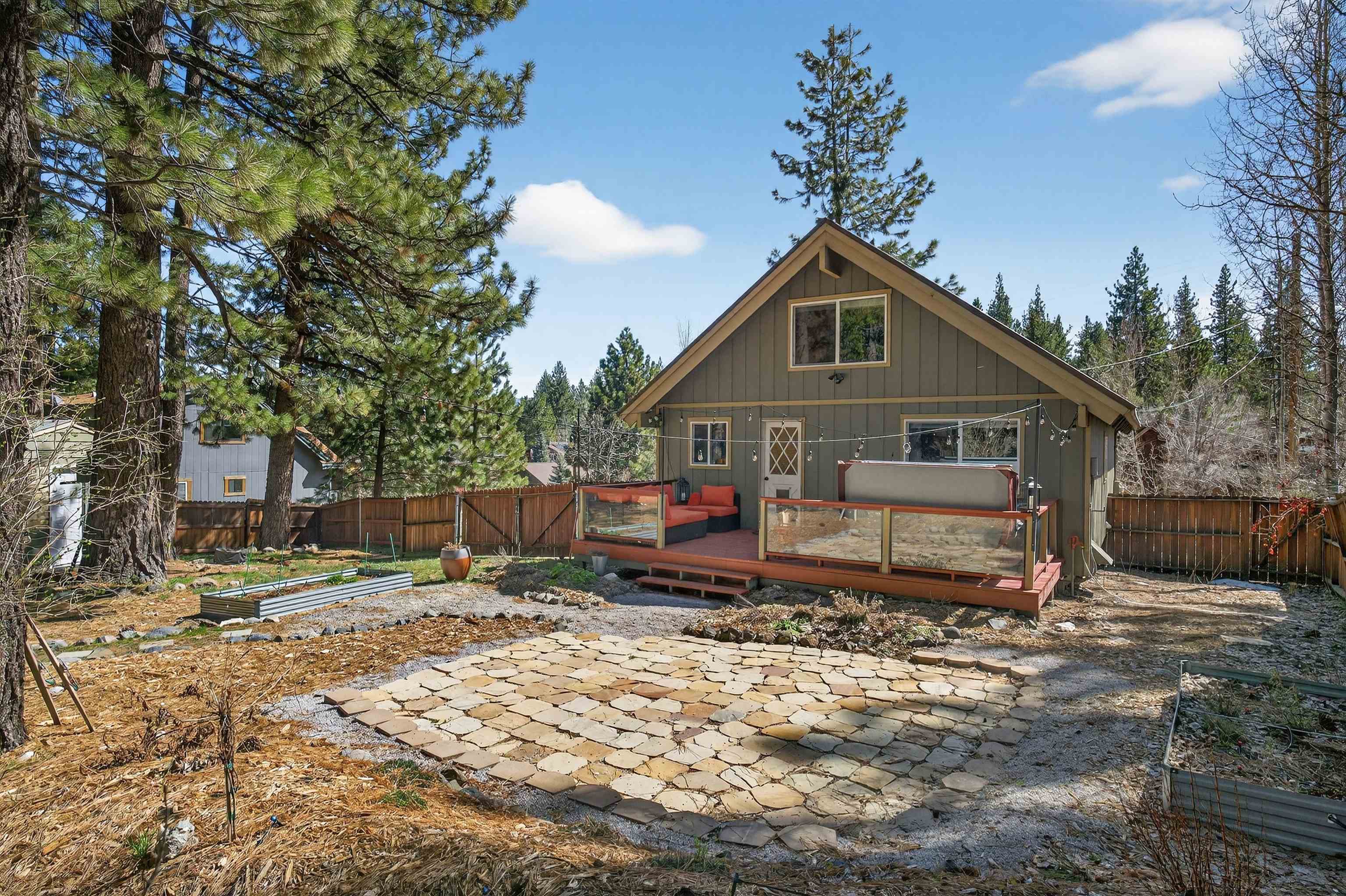 10220 Columbine Road Truckee, CA 96161 - Photo 3 of 28 a front view of a house with a yard