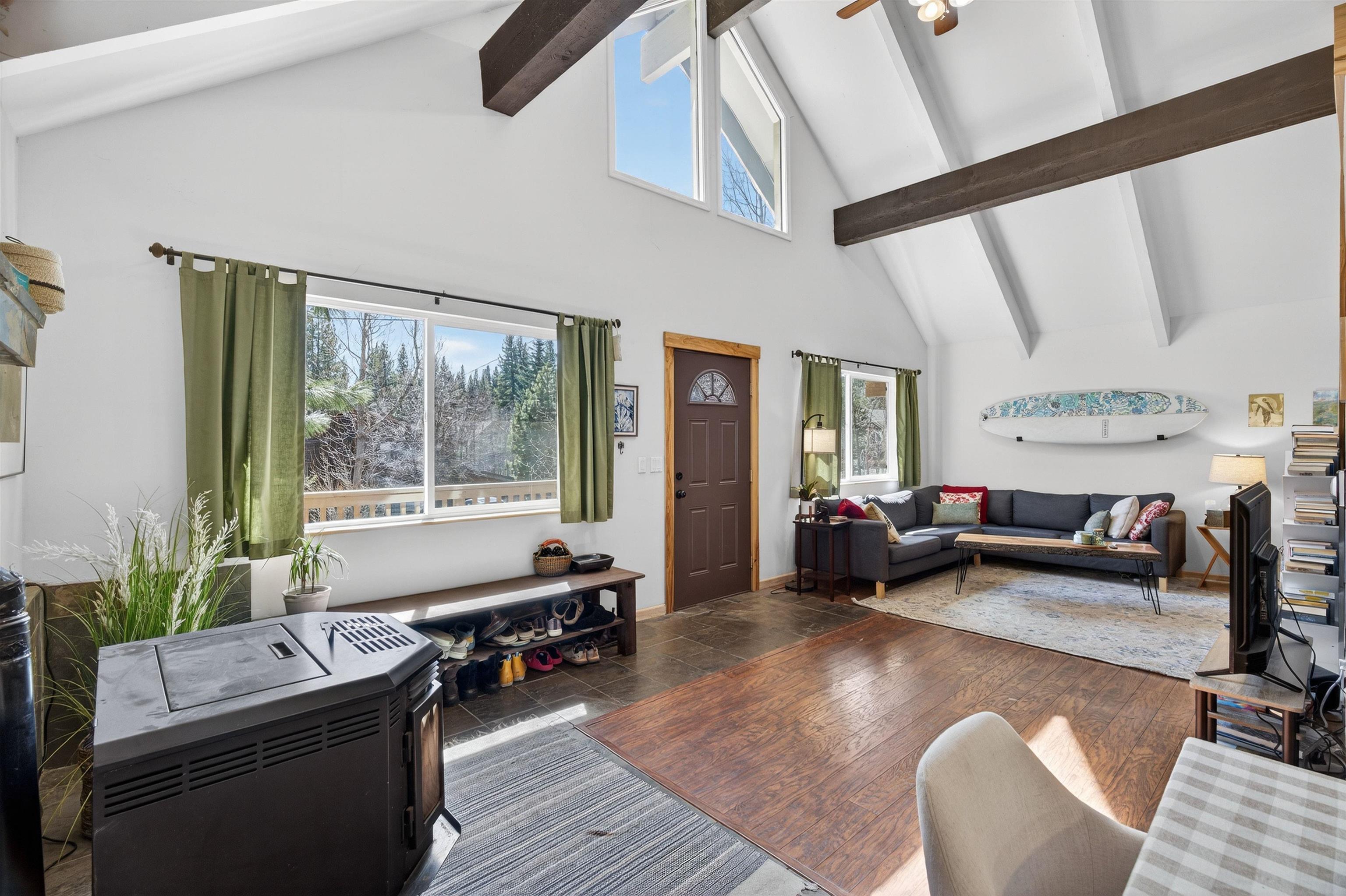 10220 Columbine Road Truckee, CA 96161 - Photo 6 of 28 a living room with furniture and a large window