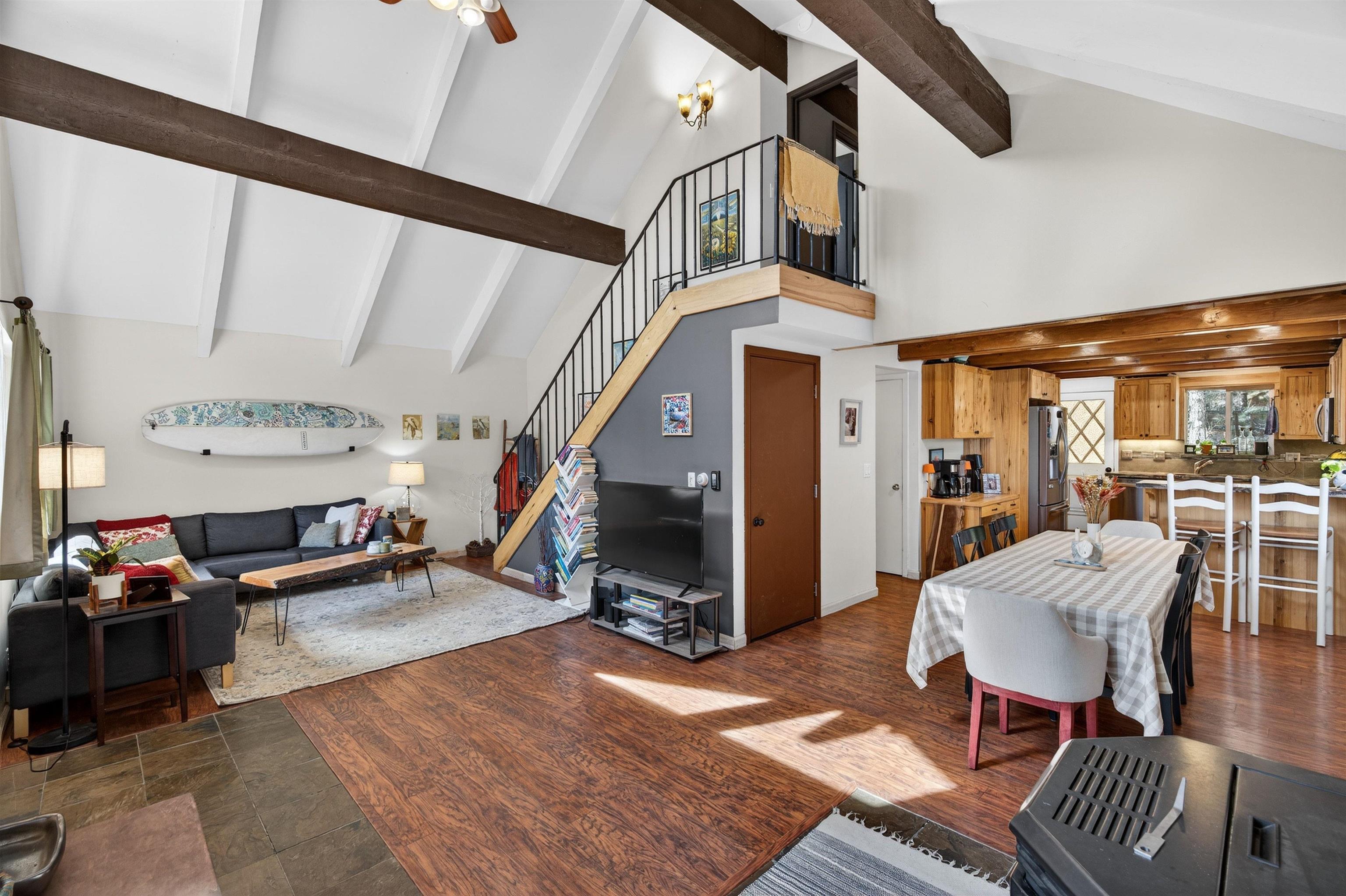 10220 Columbine Road Truckee, CA 96161 - Photo 7 of 28 a living room with furniture and a flat screen tv