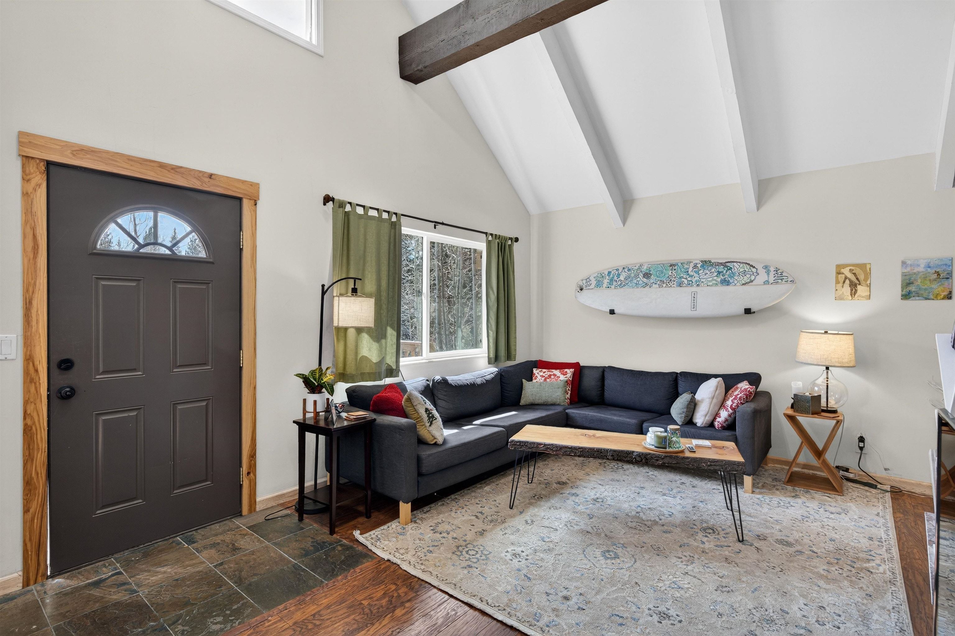 10220 Columbine Road Truckee, CA 96161 - Photo 9 of 28 a living room with furniture and a window