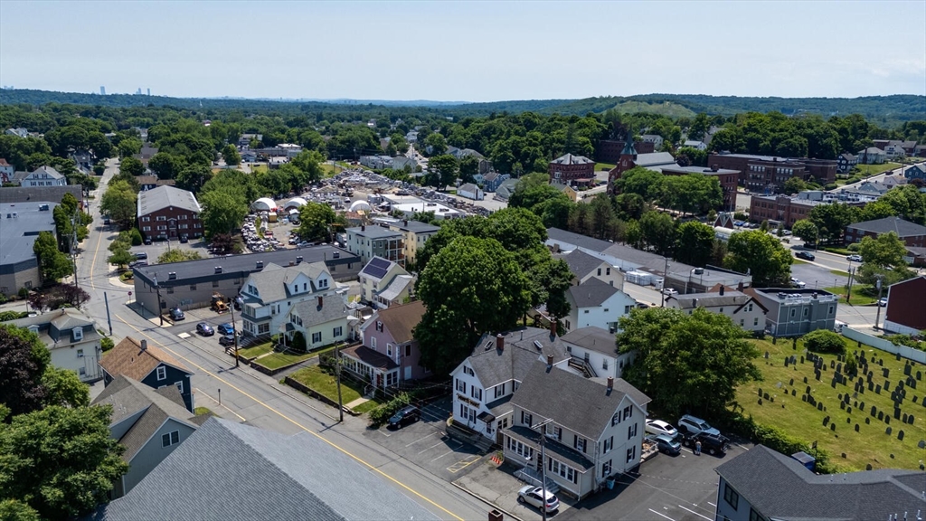 7 Prospect Street Woburn, MA 01801 - Photo 29 of 41 an aerial view of a house with a garden