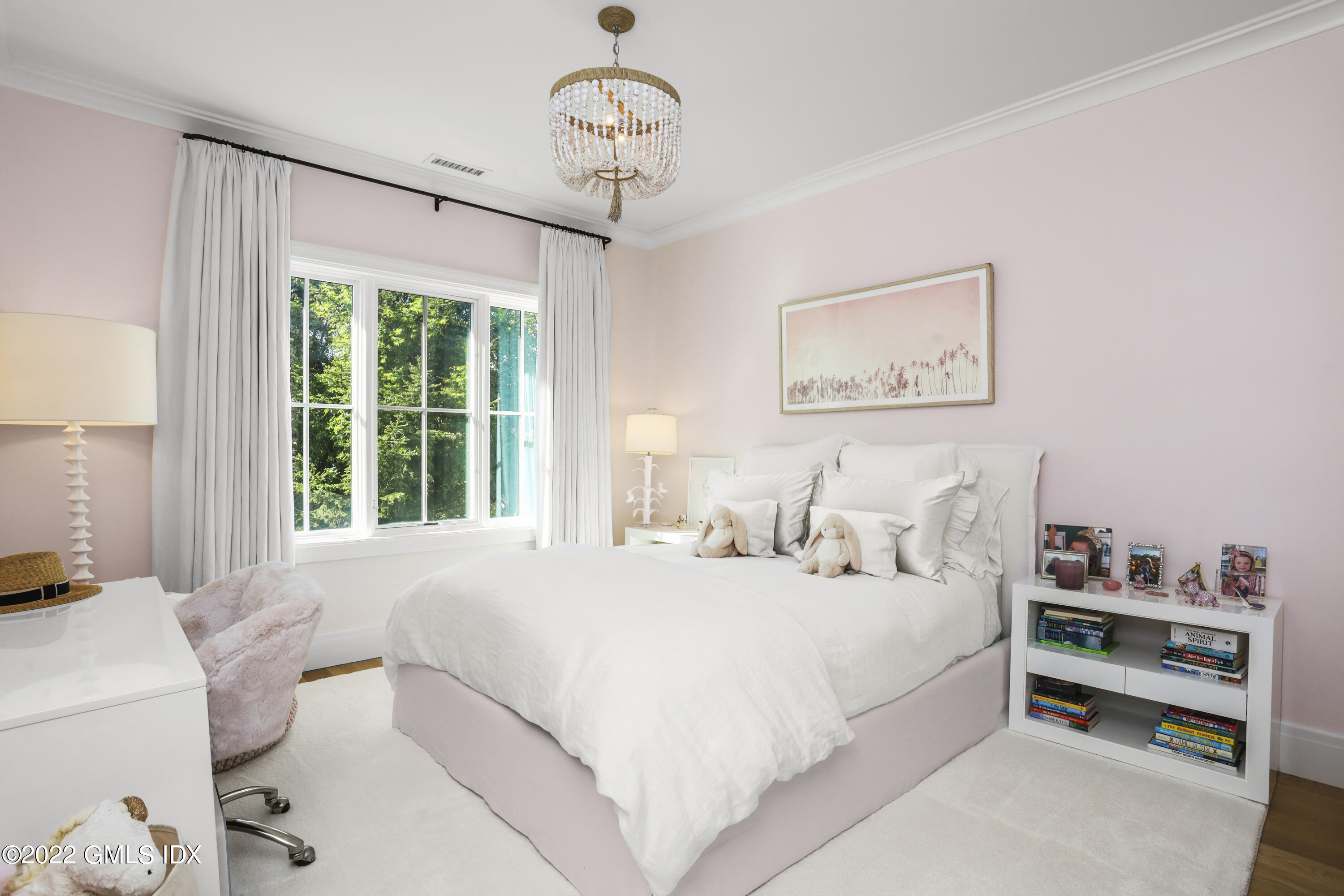 27 Linwood Avenue Riverside, CT 06878 - Photo 11 of 23 a bedroom with bed and a large window