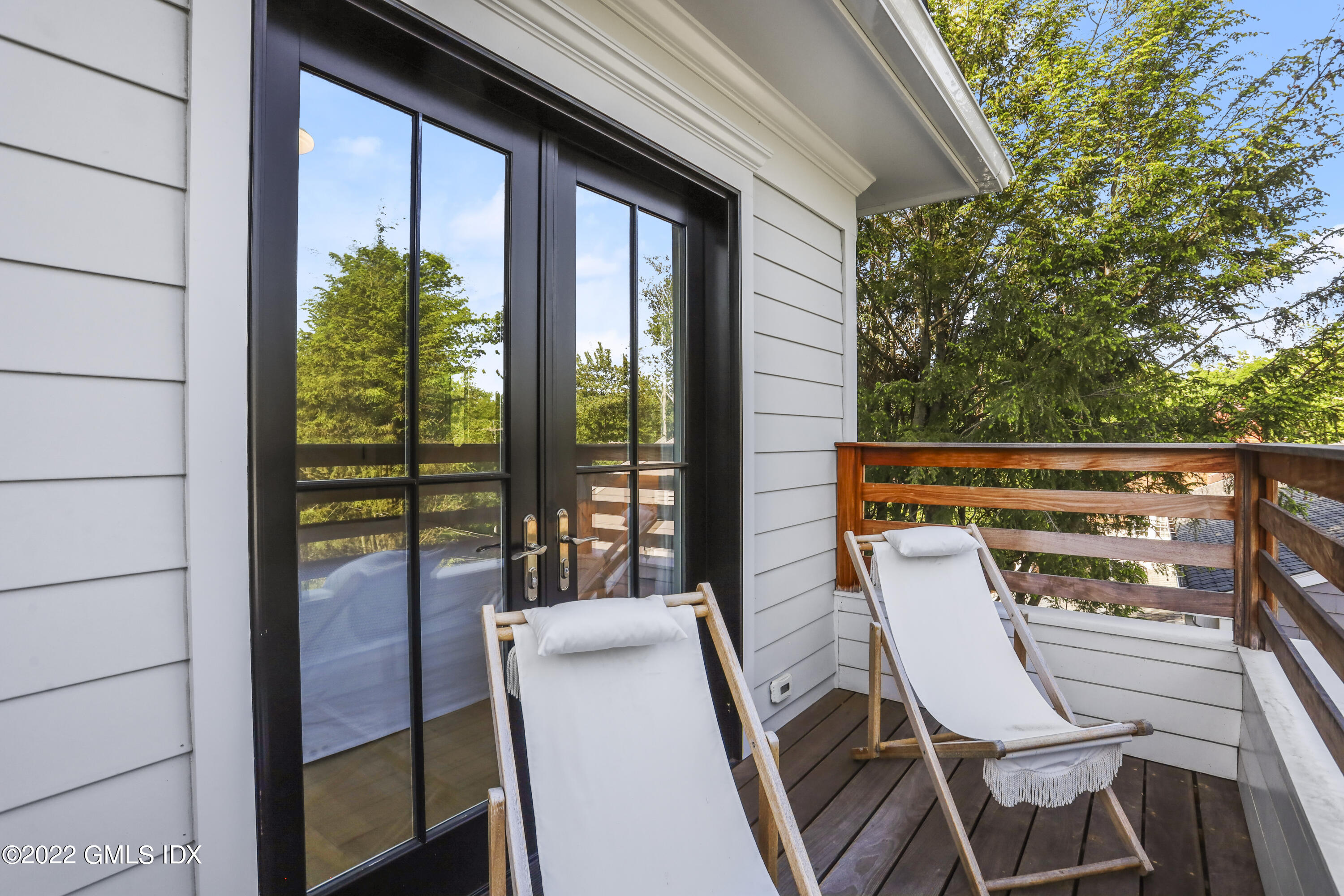 27 Linwood Avenue Riverside, CT 06878 - Photo 16 of 23 a view of deck with furniture and garden