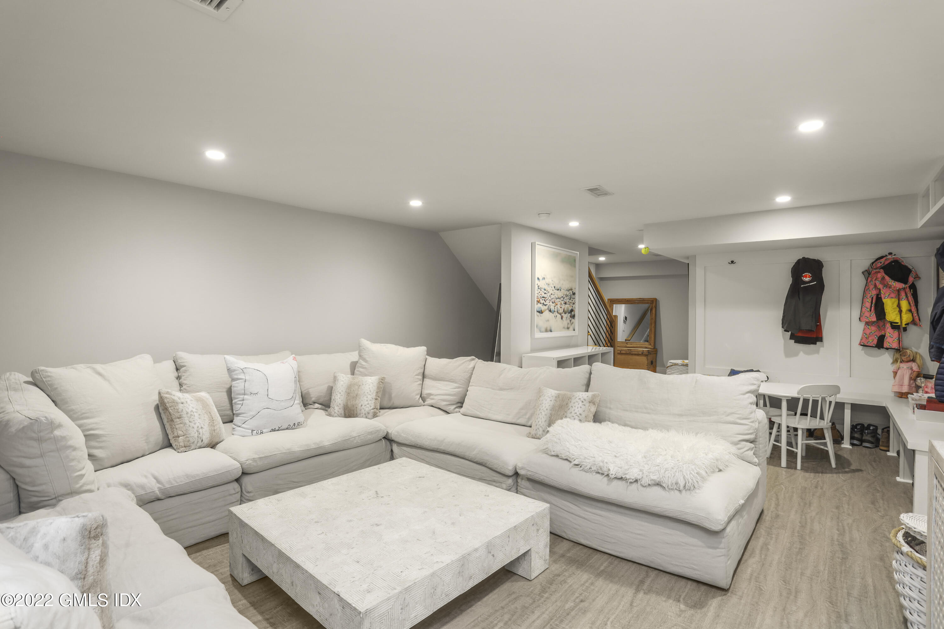 27 Linwood Avenue Riverside, CT 06878 - Photo 17 of 23 a living room with furniture and wooden floor