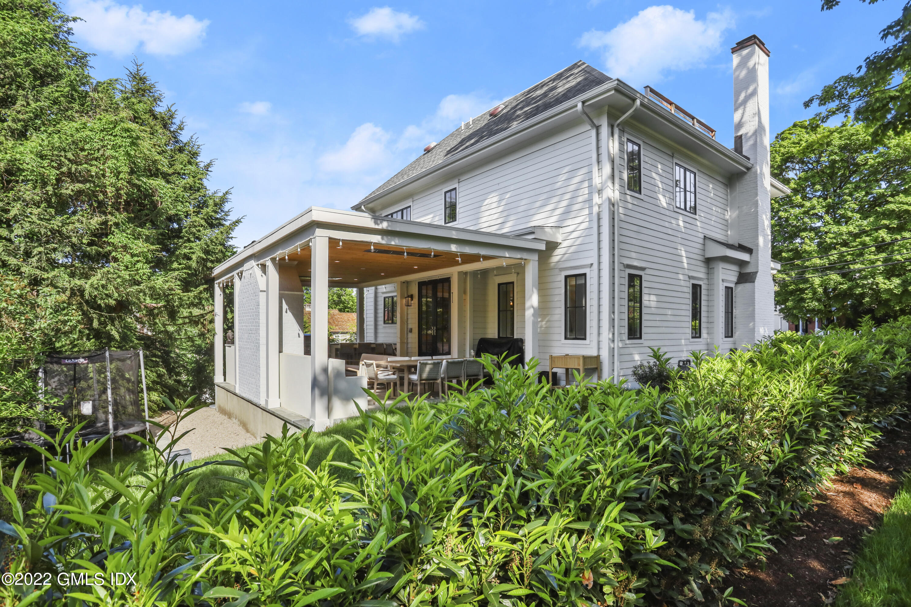 27 Linwood Avenue Riverside, CT 06878 - Photo 19 of 23 a view of a house with patio