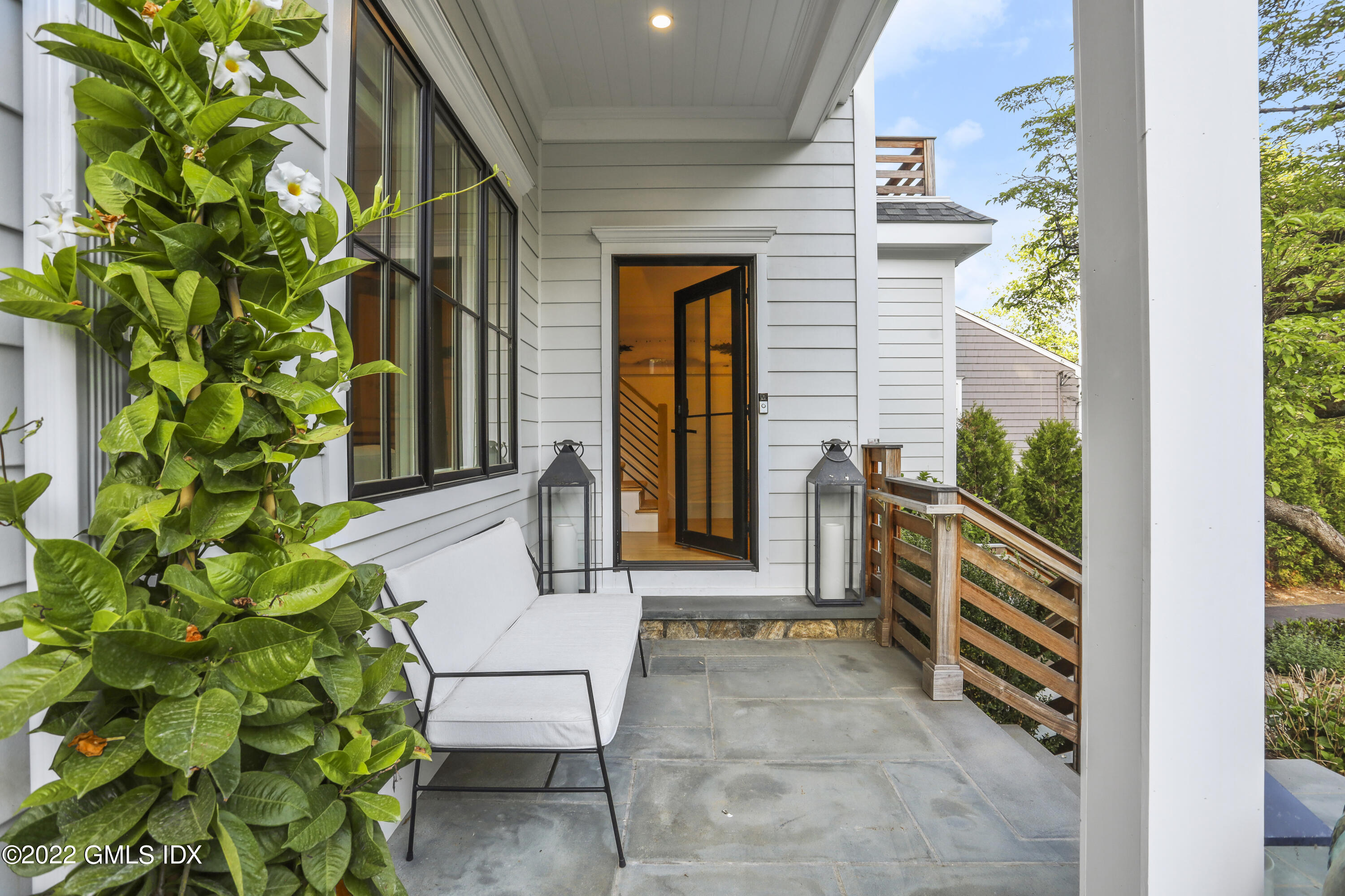27 Linwood Avenue Riverside, CT 06878 - Photo 2 of 23 a front view of a house with garden