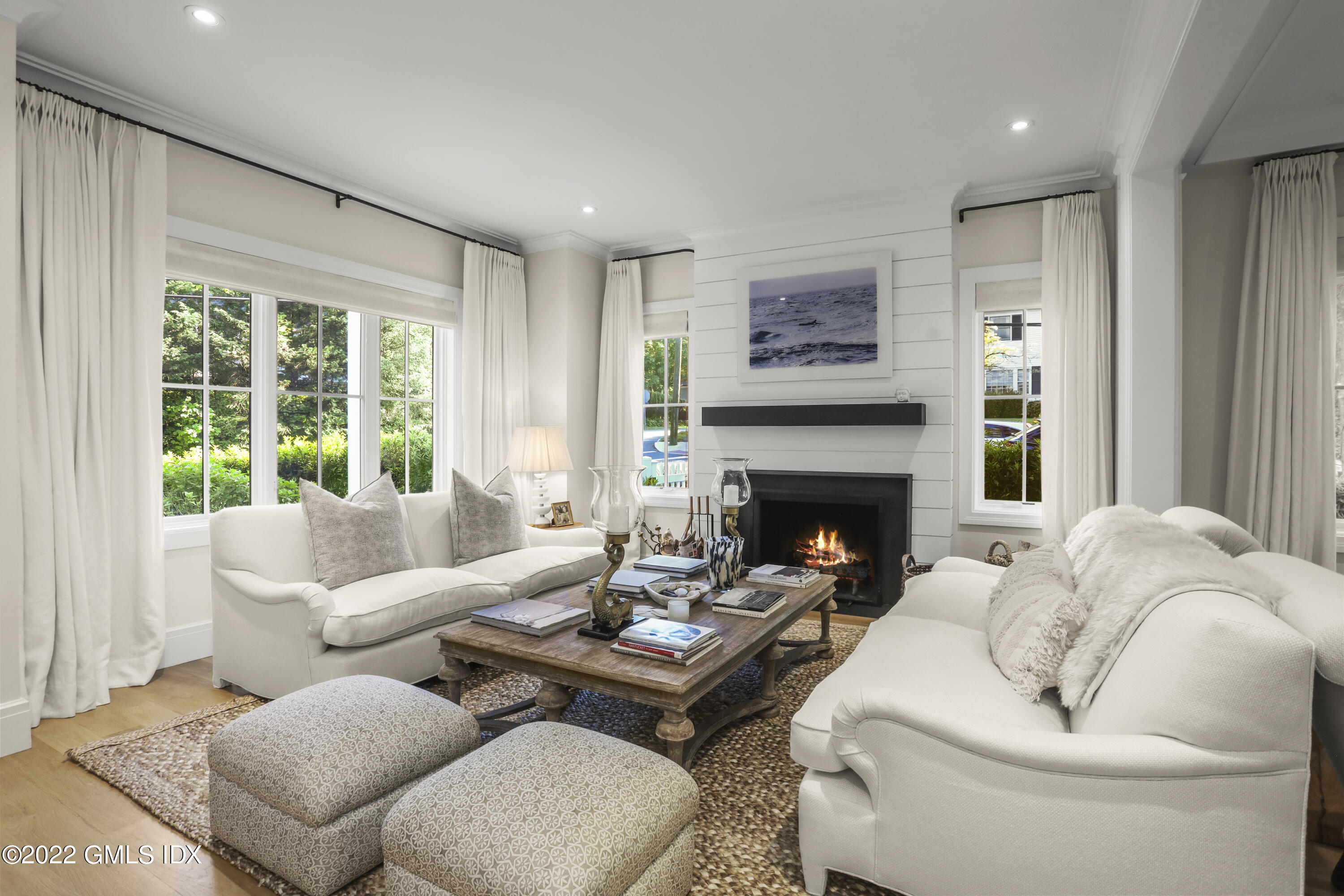 27 Linwood Avenue Riverside, CT 06878 - Photo 3 of 23 a living room with furniture large window and a fireplace