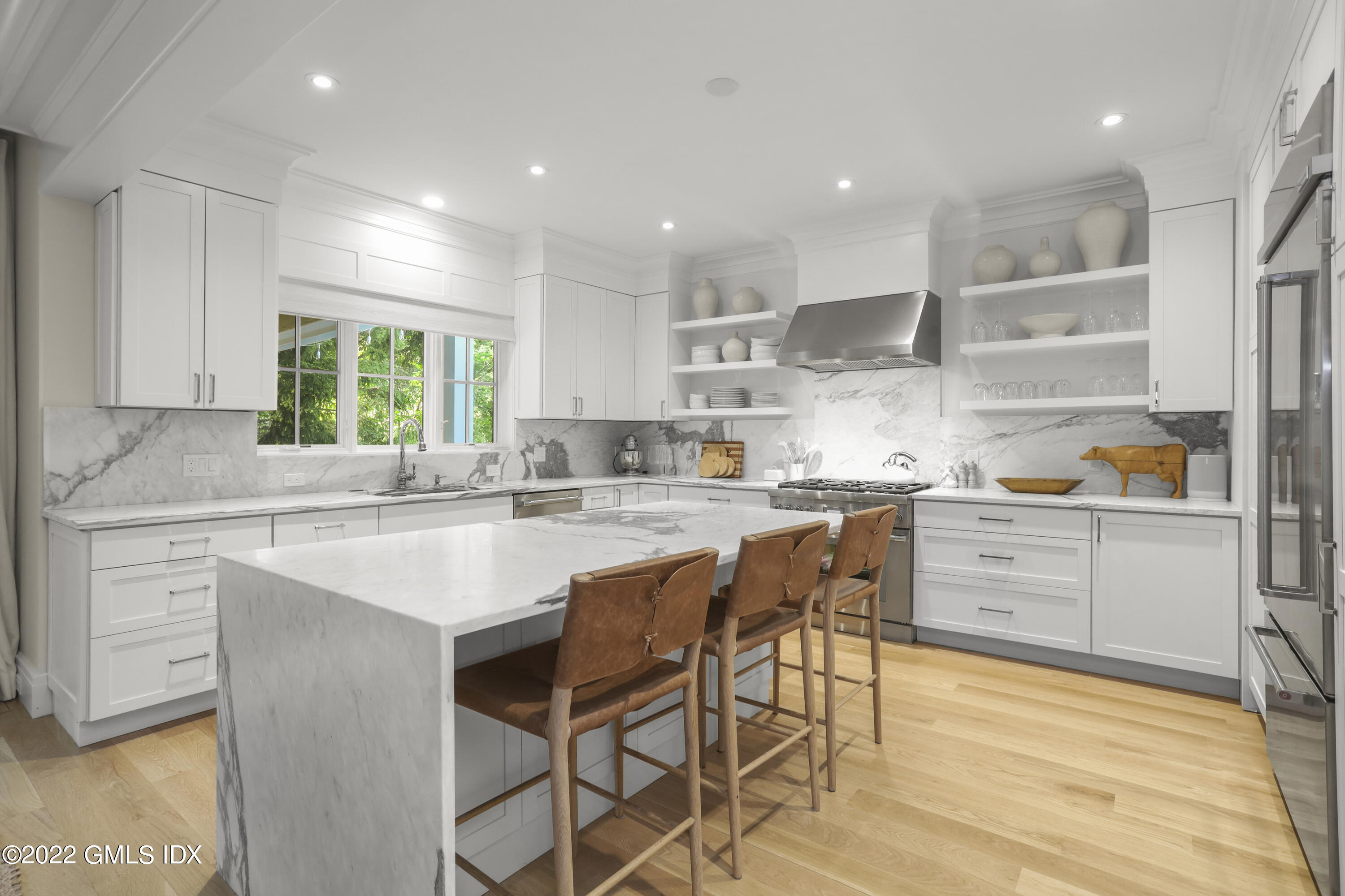 27 Linwood Avenue Riverside, CT 06878 - Photo 5 of 23 a kitchen with a sink window and cabinets