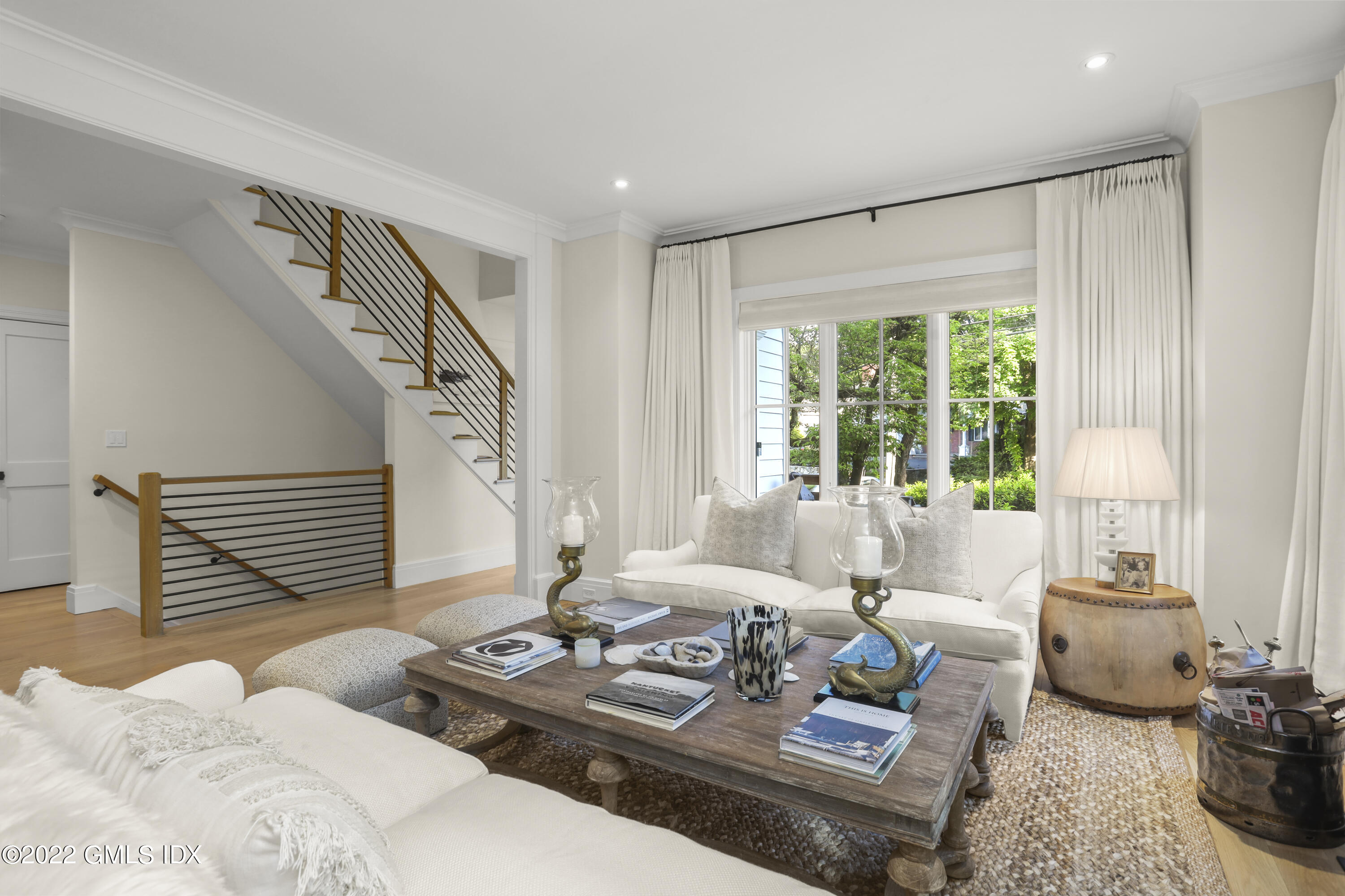 27 Linwood Avenue Riverside, CT 06878 - Photo 8 of 23 a living room with furniture and a large window