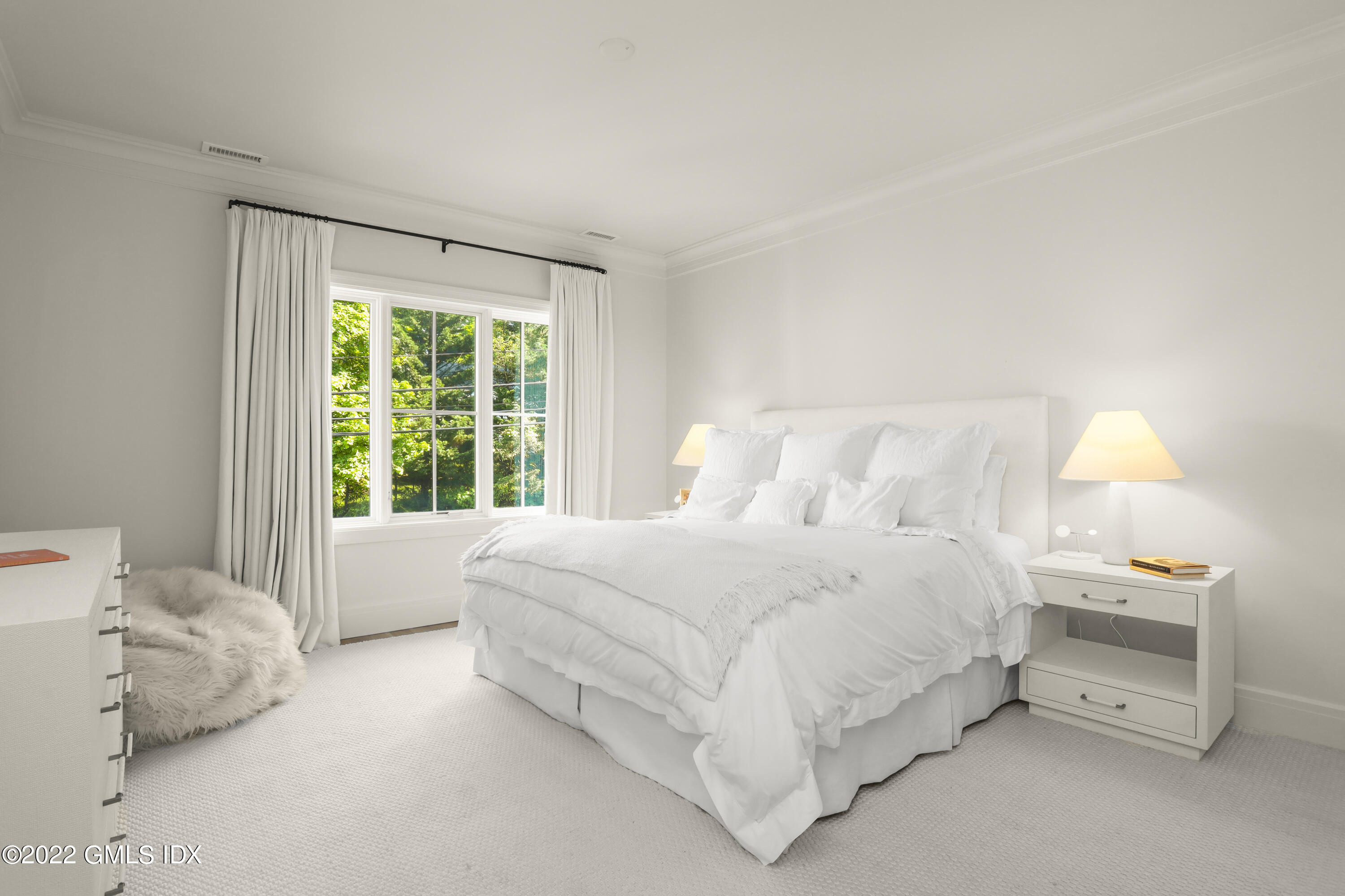 27 Linwood Avenue Riverside, CT 06878 - Photo 9 of 23 a bedroom with a bed and a window