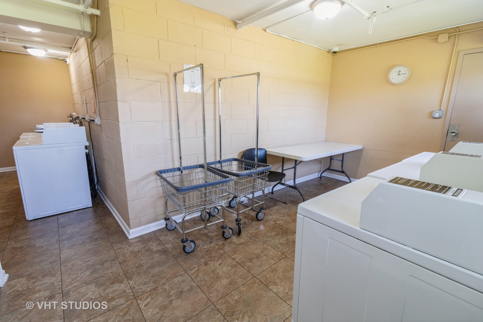 9500 Dee Road, Unit 106F Des Plaines, IL 60016 - Photo 25 of 28 a view of a room with gym equipment