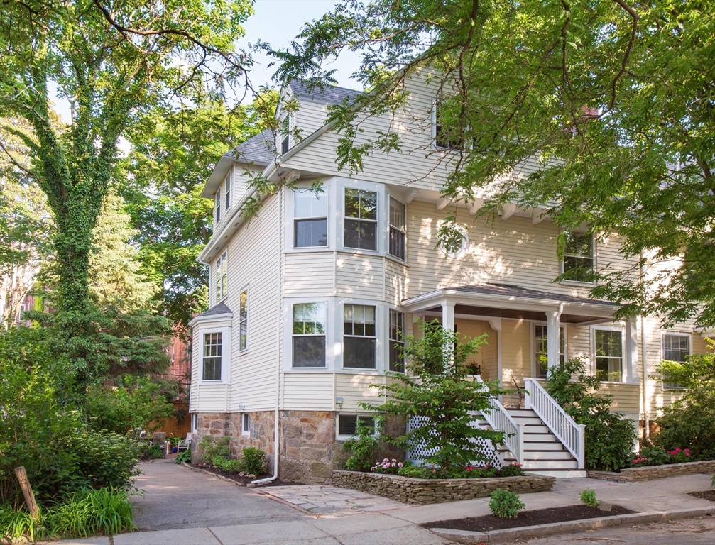 17 Coolidge Street Brookline, MA 02446 - Photo 1 of 41 a front view of a house with a yard