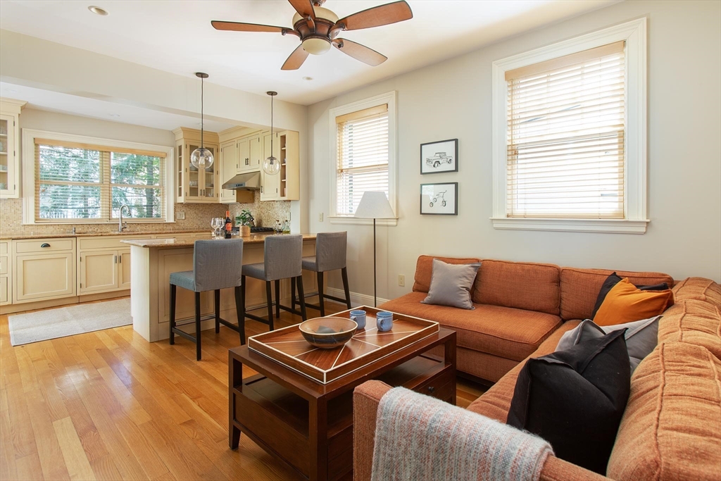 17 Coolidge Street Brookline, MA 02446 - Photo 11 of 41 a living room with furniture and a large window