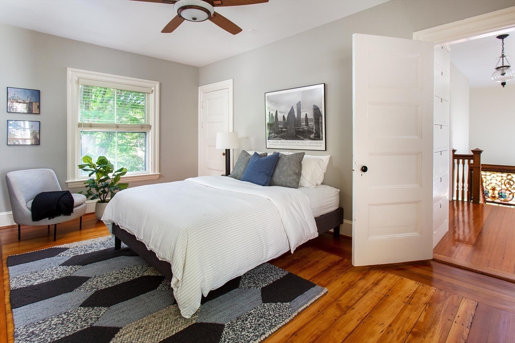 17 Coolidge Street Brookline, MA 02446 - Photo 23 of 41 a bedroom with a bed lamp closet and window
