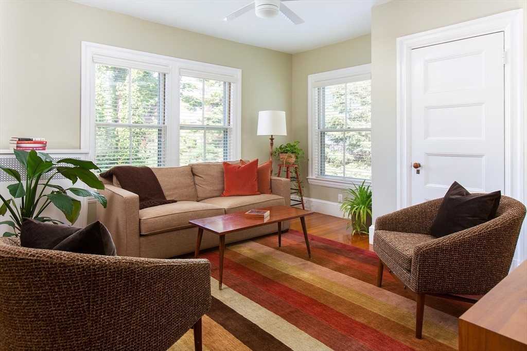 17 Coolidge Street Brookline, MA 02446 - Photo 24 of 41 a living room with furniture and a window