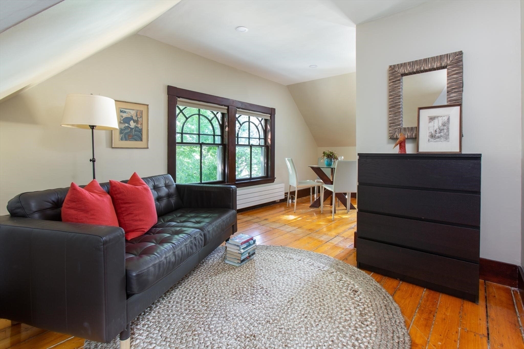 17 Coolidge Street Brookline, MA 02446 - Photo 27 of 41 a living room with furniture and a window
