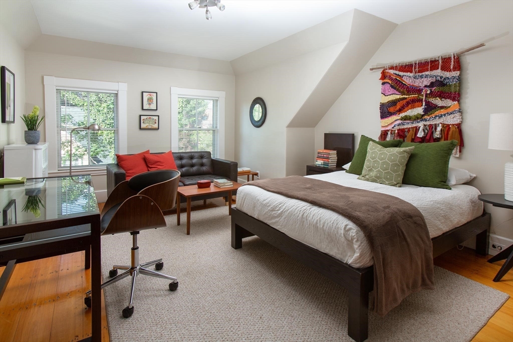 17 Coolidge Street Brookline, MA 02446 - Photo 29 of 41 a bedroom with a bed and a desk