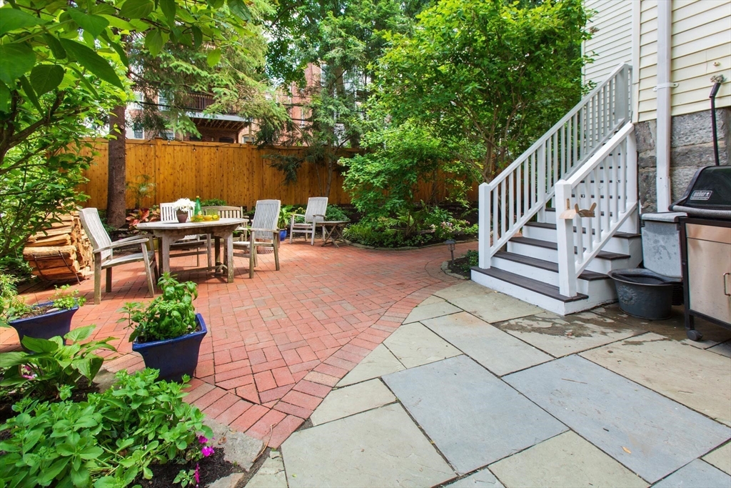 17 Coolidge Street Brookline, MA 02446 - Photo 39 of 41 a view of a patio with a table and a chairs
