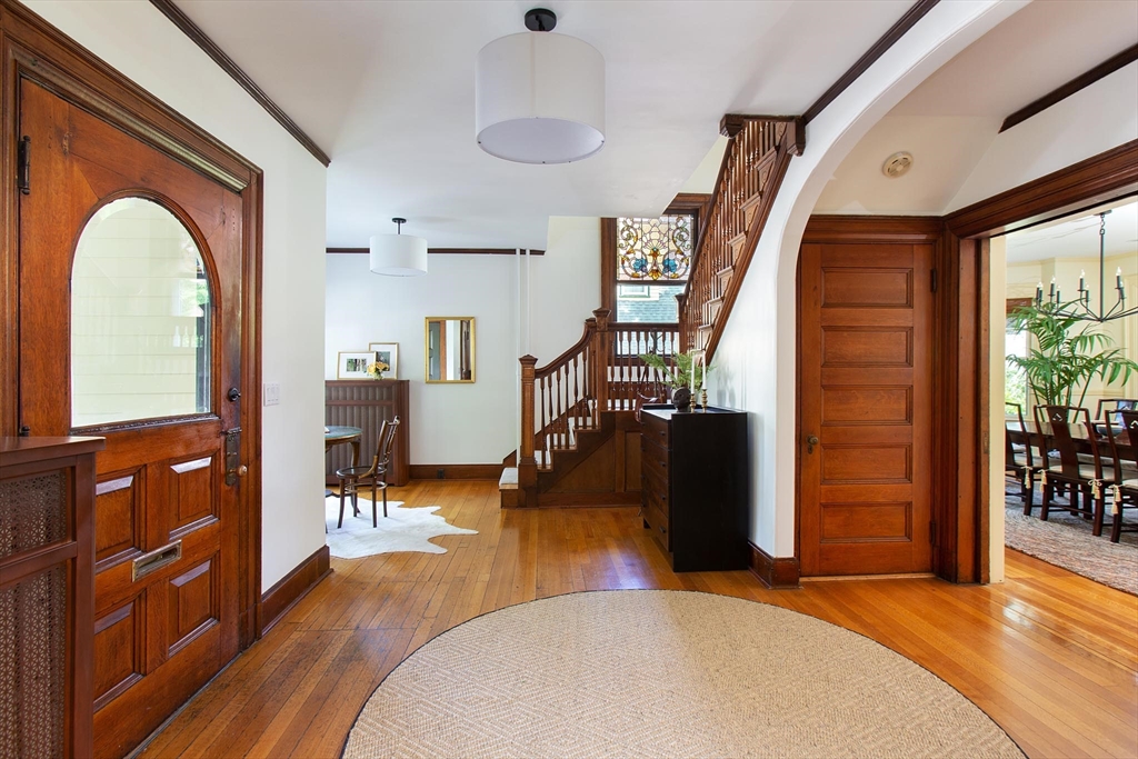 17 Coolidge Street Brookline, MA 02446 - Photo 5 of 41 a view of livingroom with furniture wooden floor and window