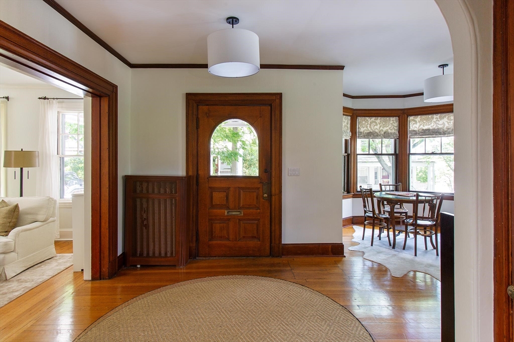 17 Coolidge Street Brookline, MA 02446 - Photo 7 of 41 a view of livingroom with furniture and wooden floor