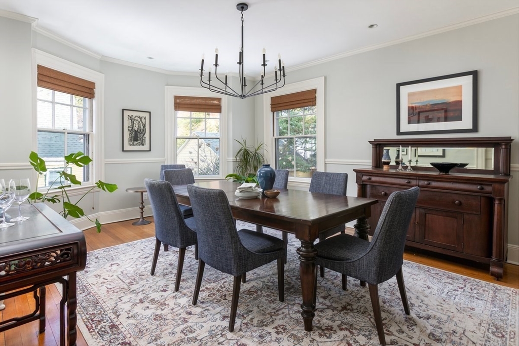 17 Coolidge Street Brookline, MA 02446 - Photo 10 of 41 a view of a dining room with furniture window and wooden floor
