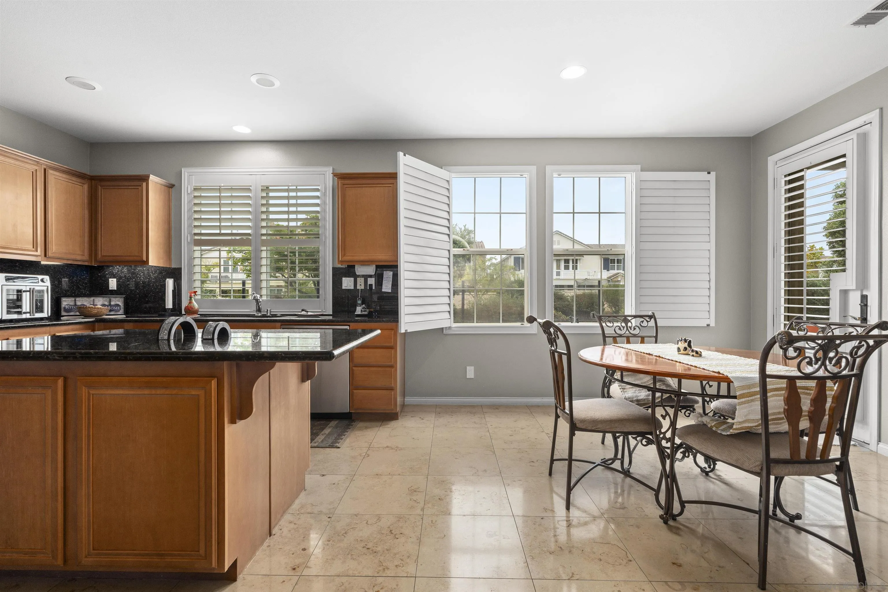 840 Luminara Way San Marcos, CA 92078 - Photo 11 of 57 a living room with furniture and large windows