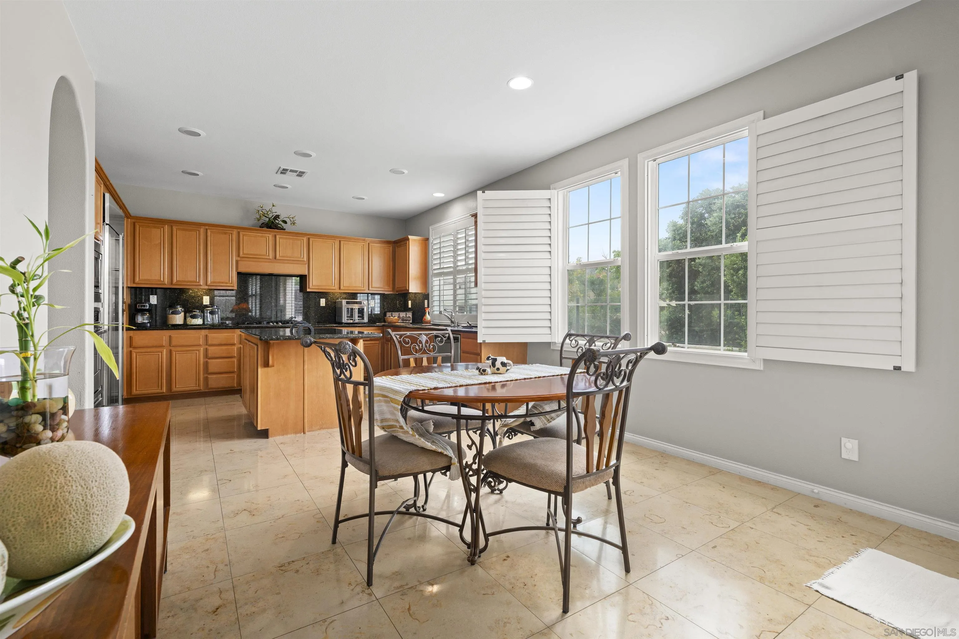 840 Luminara Way San Marcos, CA 92078 - Photo 19 of 57 a view of a dining room with furniture window and outside view