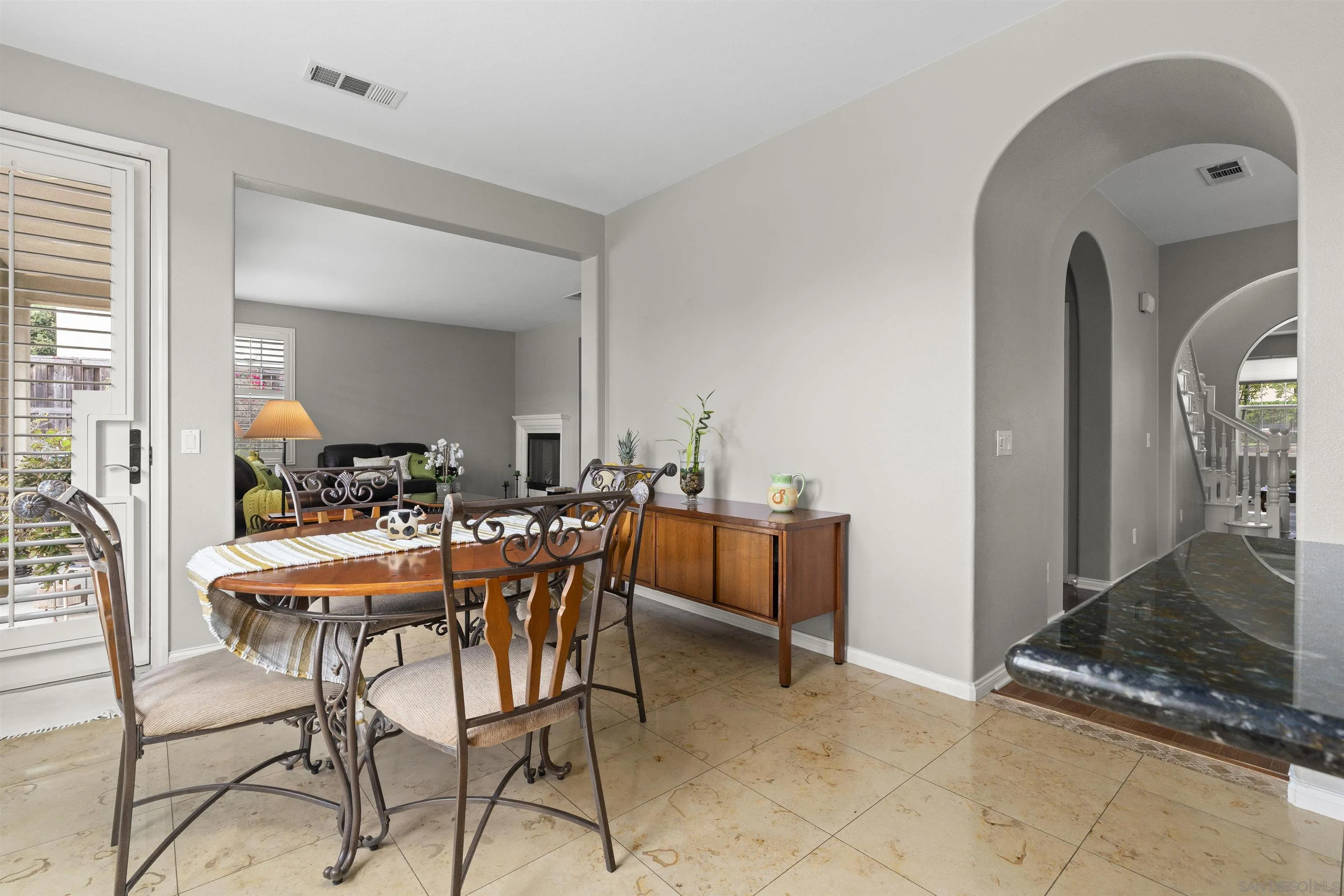 840 Luminara Way San Marcos, CA 92078 - Photo 20 of 57 a view of a dining room with furniture