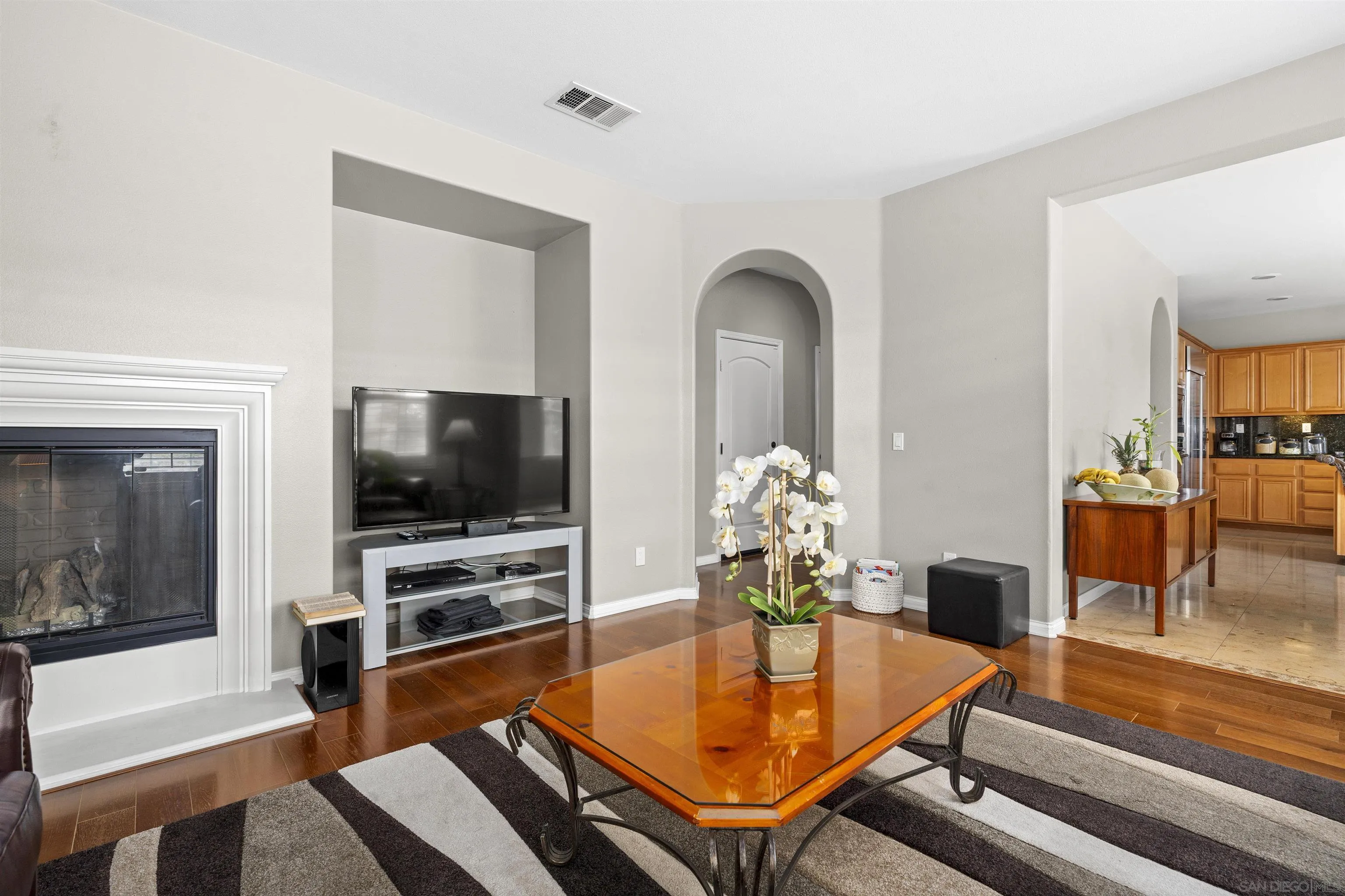 840 Luminara Way San Marcos, CA 92078 - Photo 22 of 57 a living room with furniture and a flat screen tv